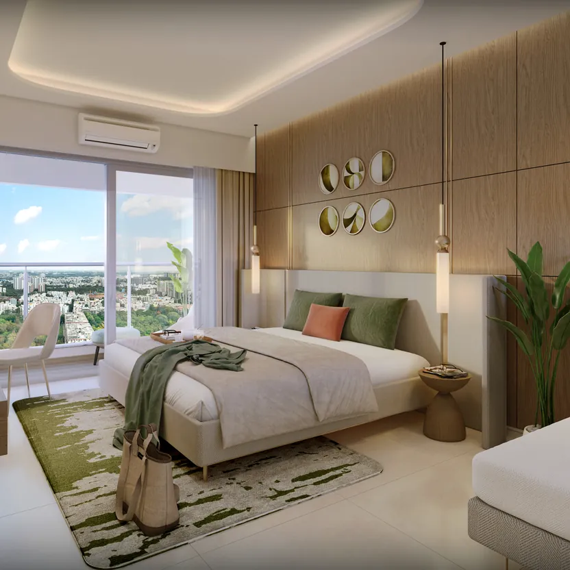 A bedroom with a wide window and soft green accents